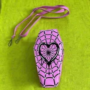 Pink spiderweb purse